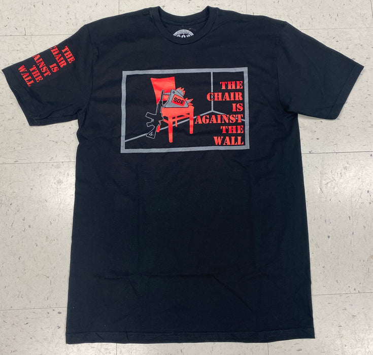 The Chair is against the wall t shirt