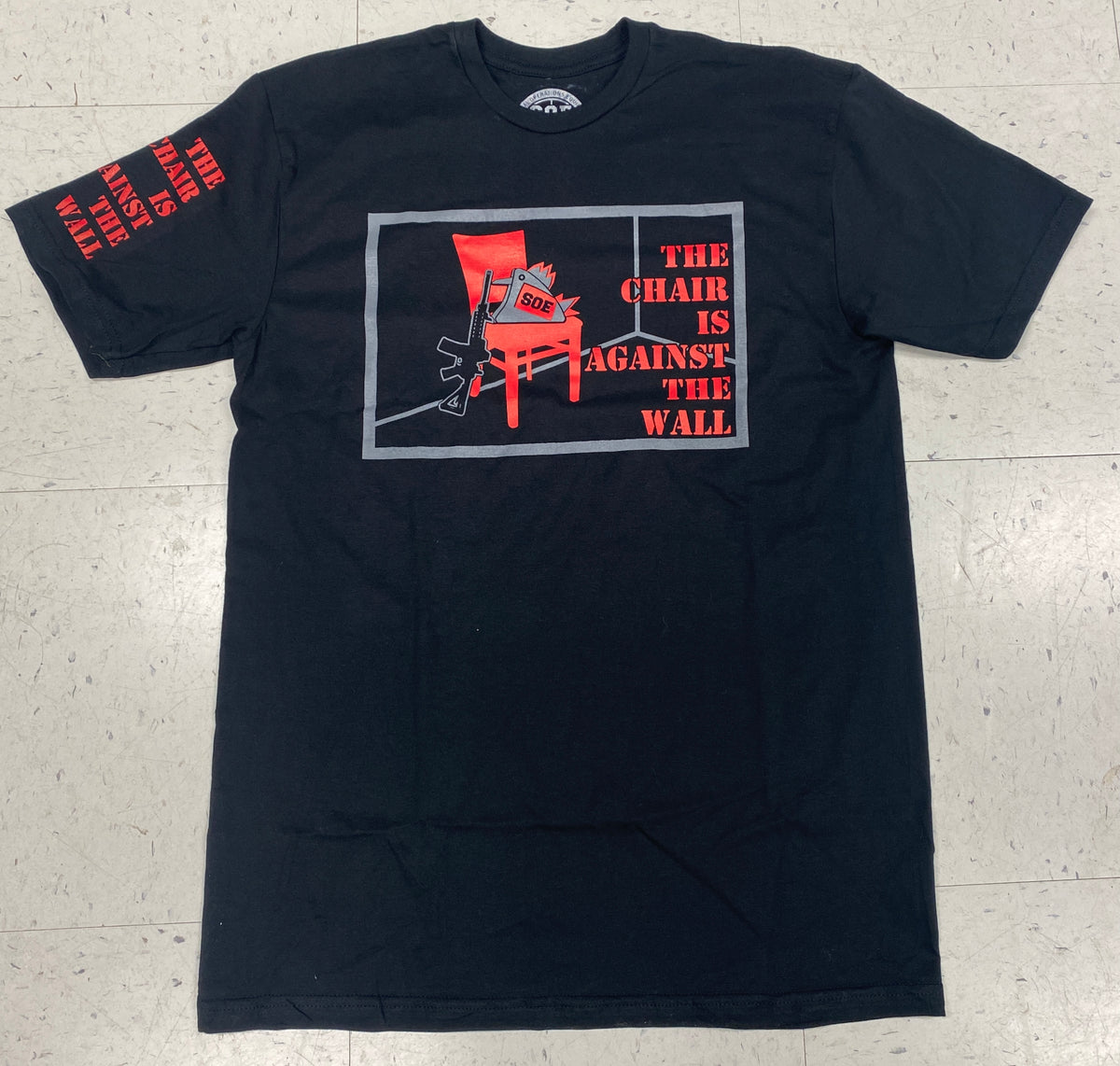 The Chair is against the wall t shirt — Special Operations Equipment